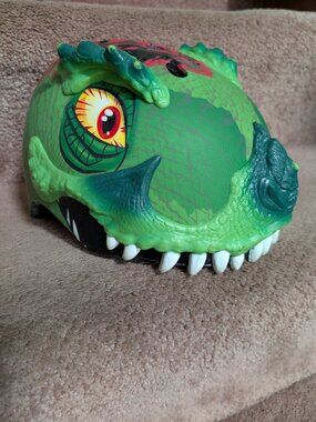Raskullz helmet dinosaur size small (50-54cm) green red